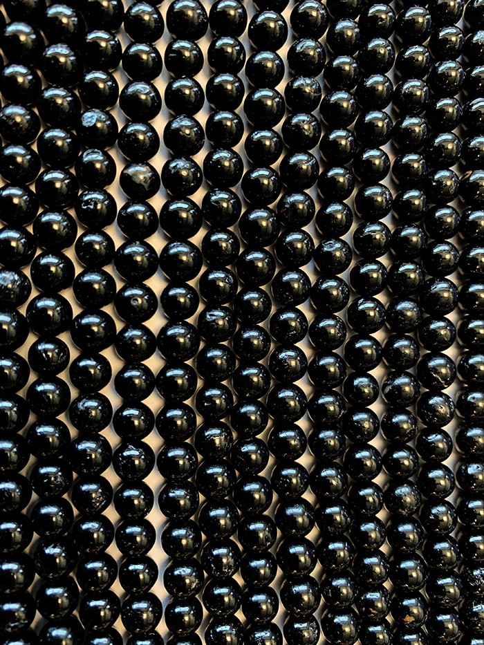 Schwarzes Turmalin A Perlen 5-6mm auf 40cm Faden