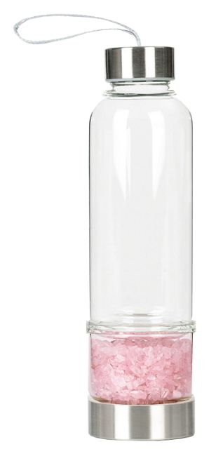 Flasche mit Rosenquarz-Kristallen
