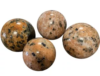 4 polierte orangefarbene Calcit-Kugeln 2.129 kg