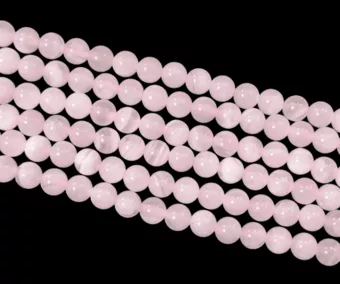 Rosa Calcit AA 6 mm auf 40 cm Draht