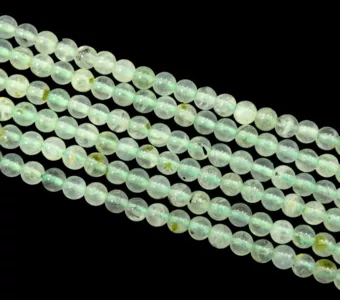 Prehnit A+ Perlen 4.5 mm auf 40 cm Draht