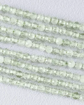 Facettierte Prehnit-AA-Perlen 3 mm auf 40 cm Draht
