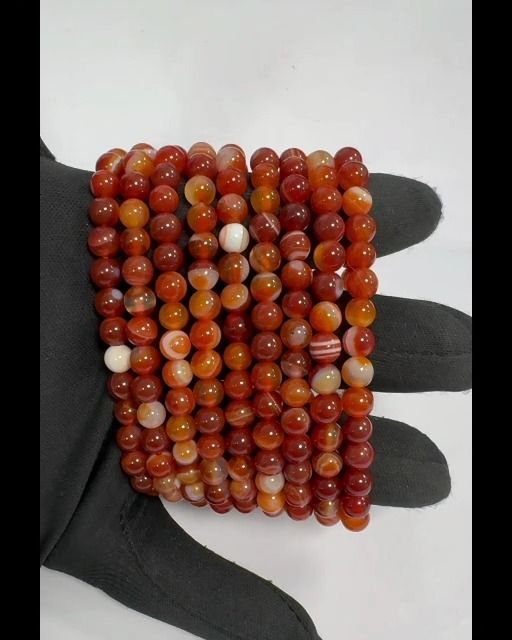 Armband aus rotem Achat A mit Bändern und 6-mm-Perlen