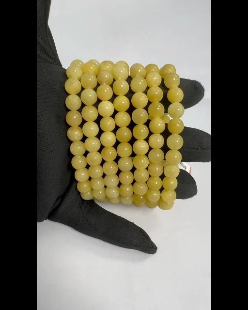 Armband Orangencalcit A perles 8mm