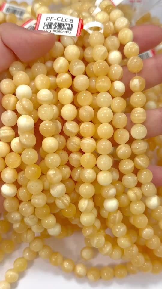 Orangefarbene Calcitperlen 8–8.5 mm auf 40 cm Draht