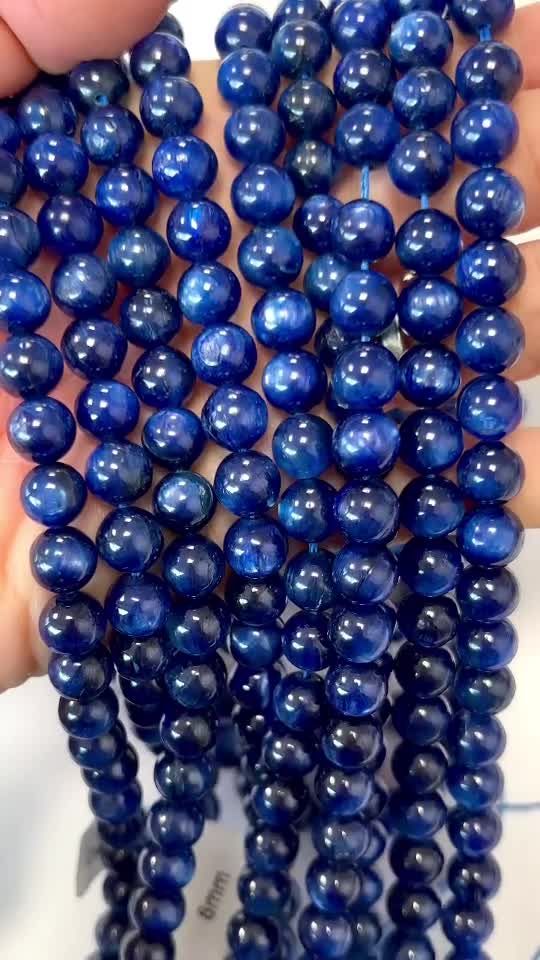 Erhitzte blaue Kyanit-AA-Perlen 8 mm auf einem 40 cm langen Faden