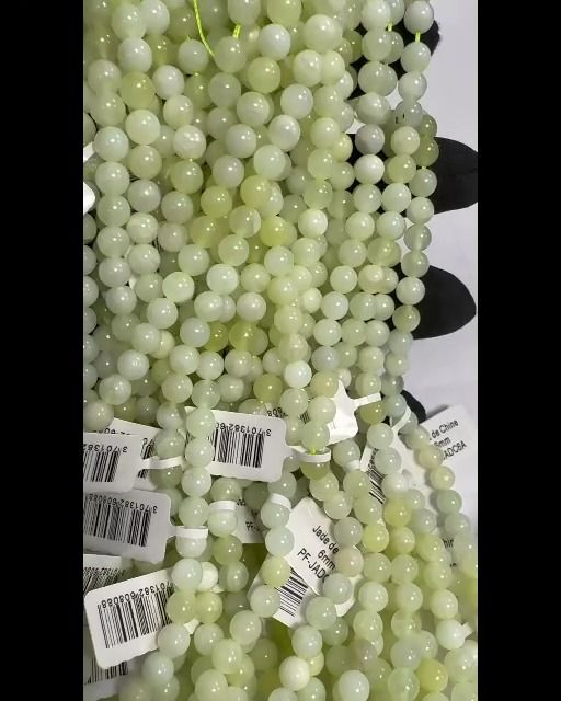 Jade von China A Perlen 6mm auf 40cm Faden